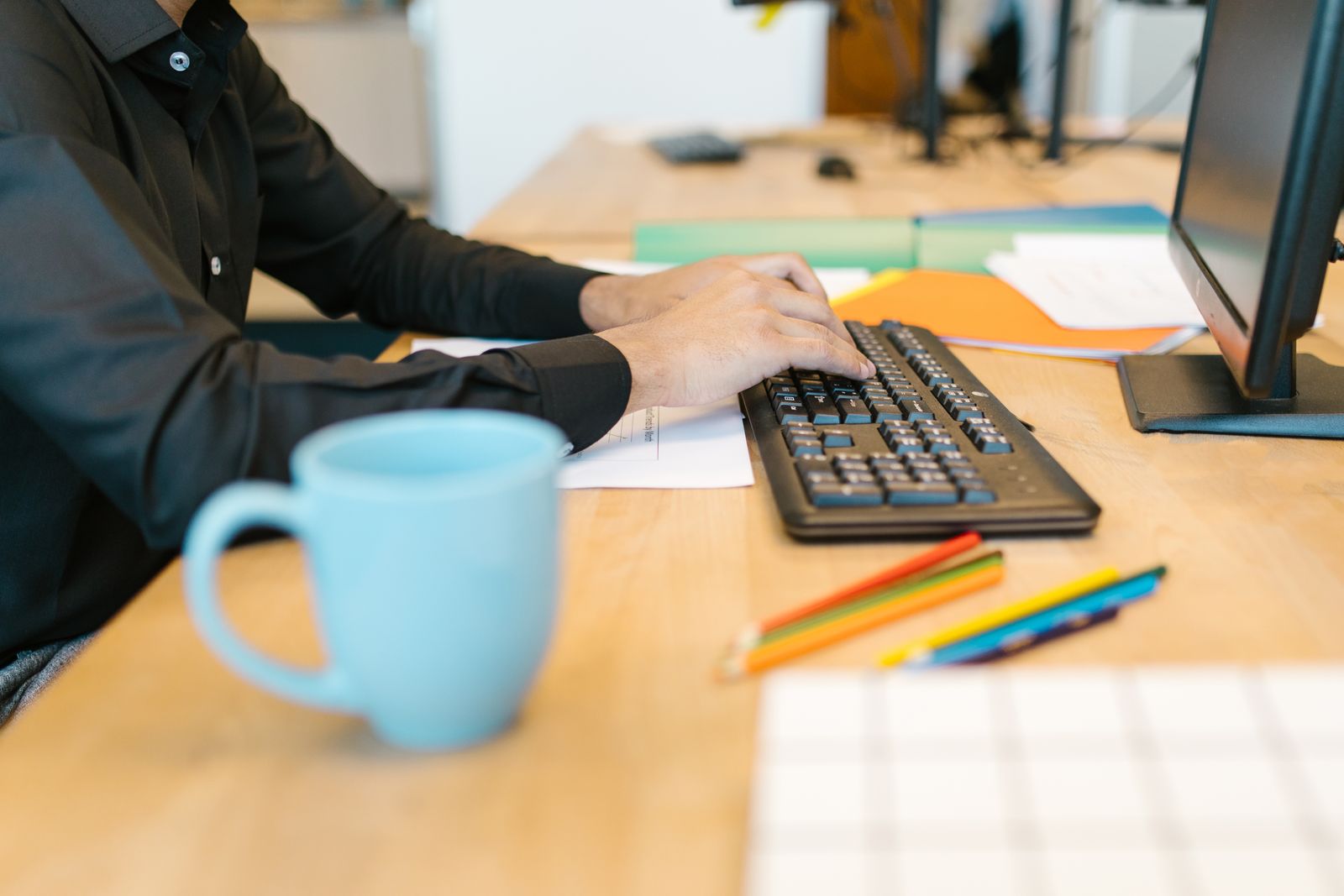 Person working at a desk during a transition period