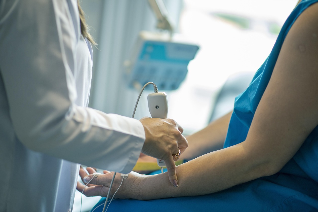 A friendly doctor talking with a patient during a routine checkup